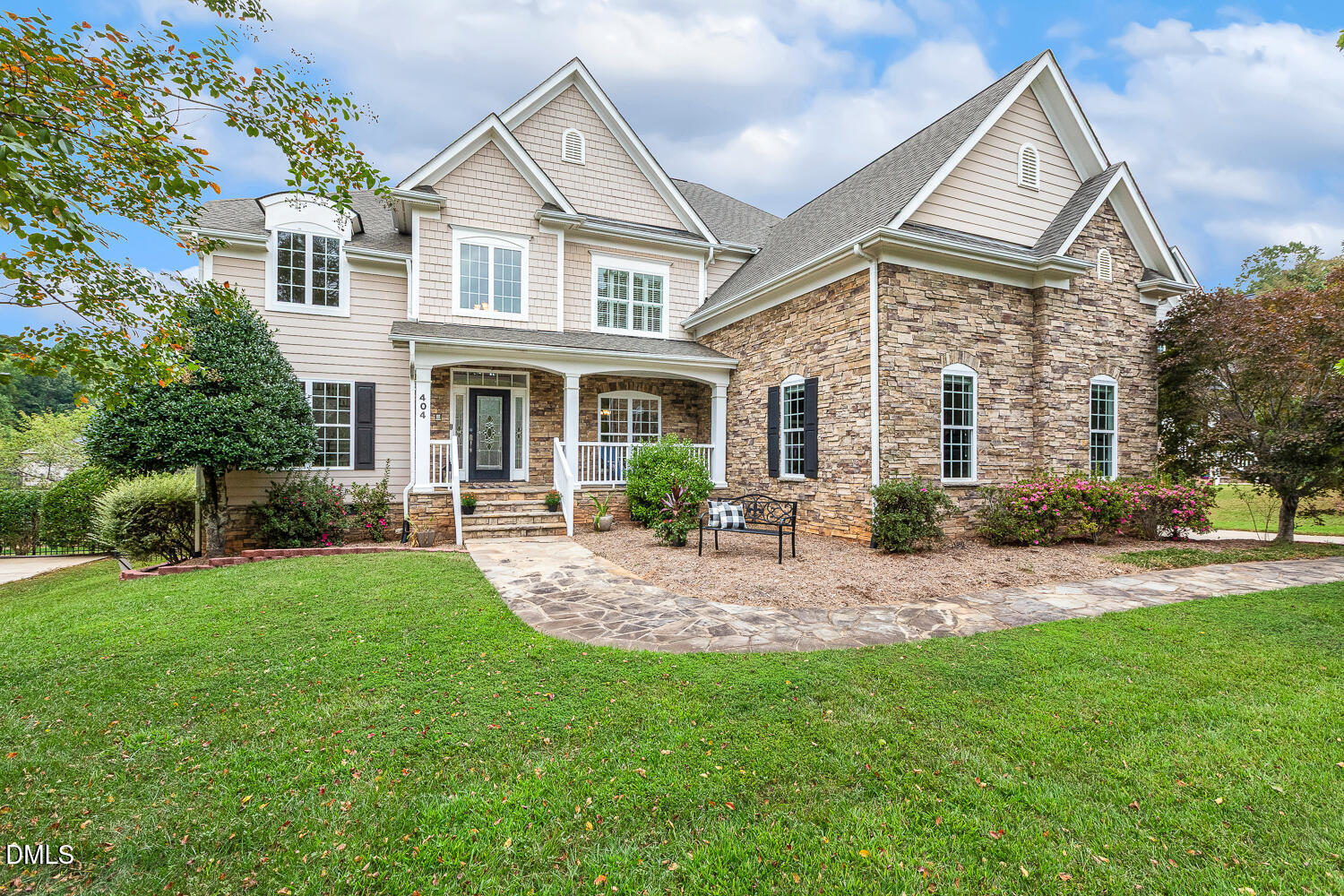 404 Vintage Hill Circle Apex, NC 27539 - Photo 2 of 82 a front view of a house with yard and green space