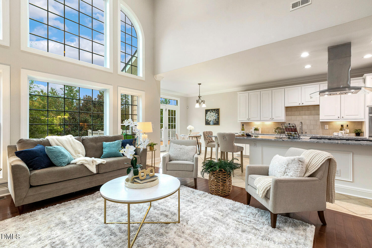 404 Vintage Hill Circle Apex, NC 27539 - Photo 22 of 82 a living room with furniture and a large window