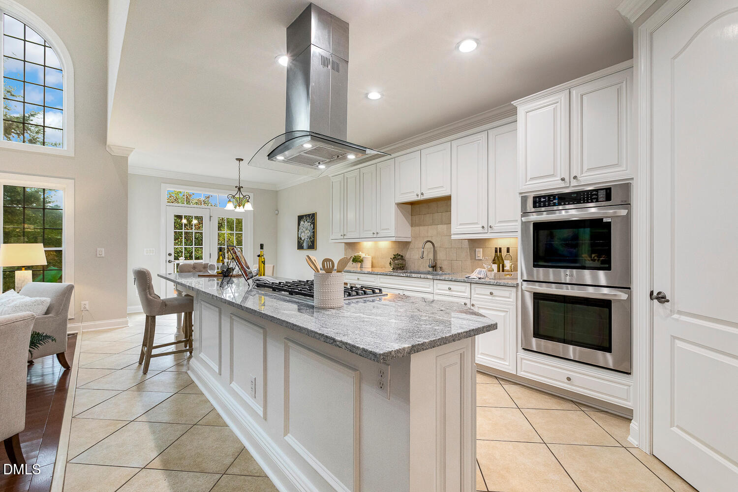 404 Vintage Hill Circle Apex, NC 27539 - Photo 24 of 82 a kitchen with stainless steel appliances granite countertop a stove top oven a sink dishwasher and a refrigerator with the cabinets