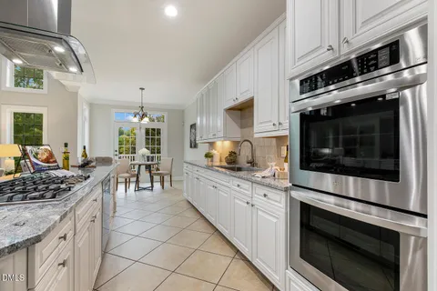 a bedroom with a large bed and a large window