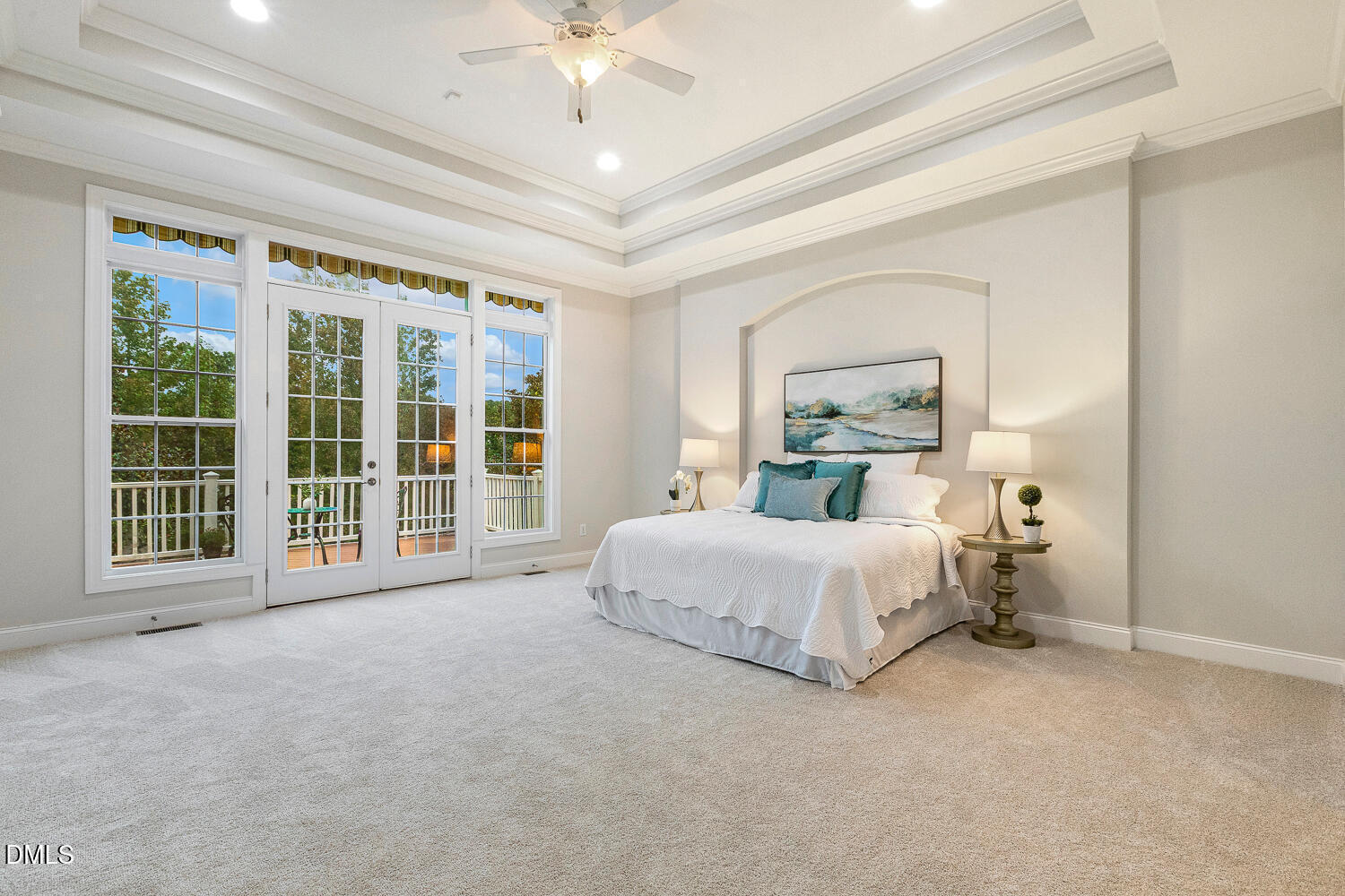 404 Vintage Hill Circle Apex, NC 27539 - Photo 35 of 82 a spacious bedroom with a bed and a large window