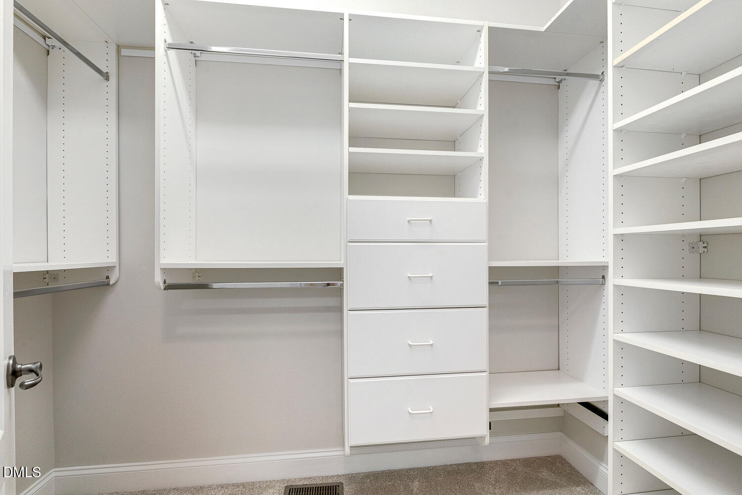 404 Vintage Hill Circle Apex, NC 27539 - Photo 40 of 82 a view of walk in closet with empty racks