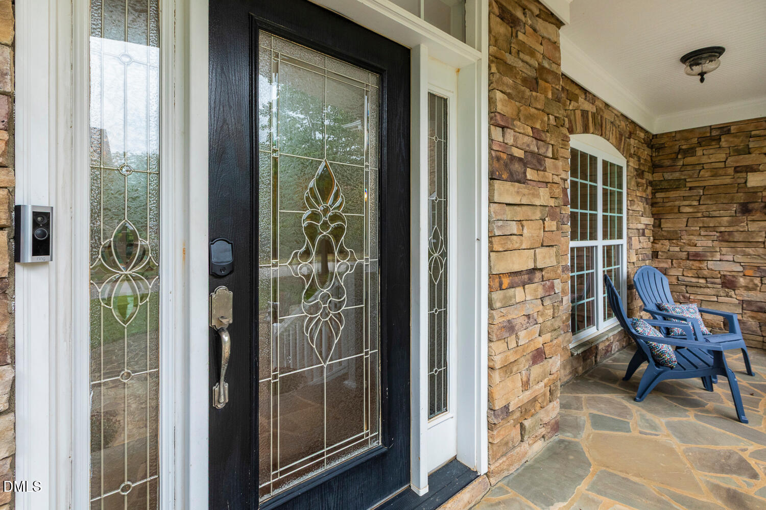 404 Vintage Hill Circle Apex, NC 27539 - Photo 5 of 82 a view of a balcony with chair and door