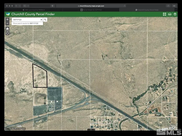 a view of a balcony with wooden floor and a yard