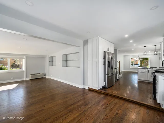 a view of a livingroom with wooden floor