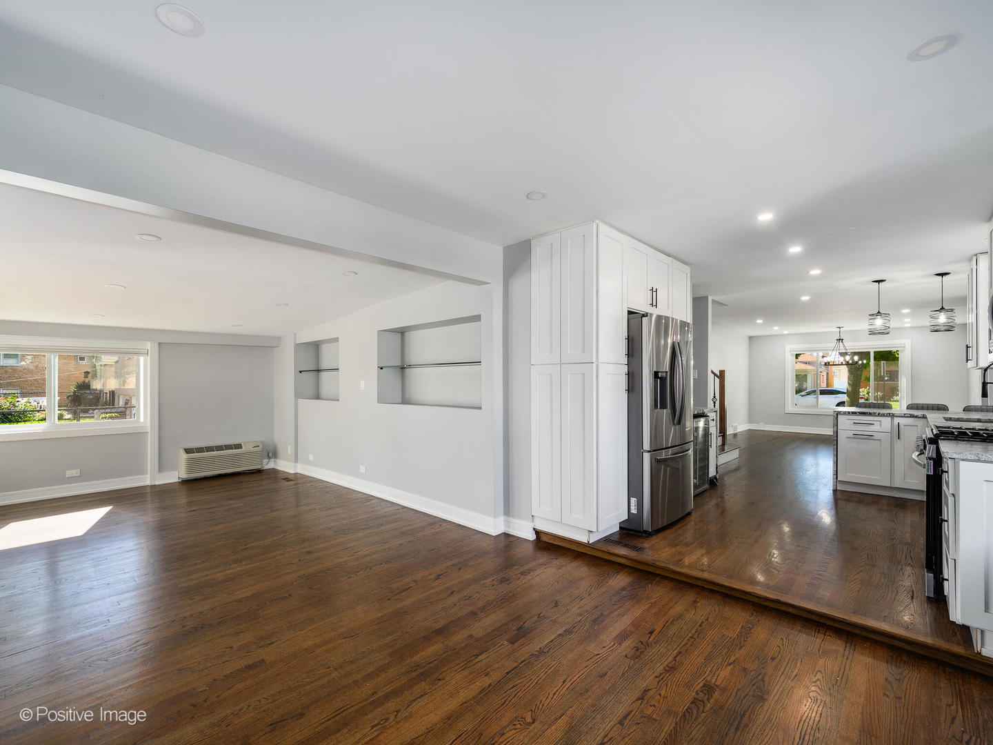7225 East Prairie Road Lincolnwood, IL 60712 - Photo 16 of 27 a view of a livingroom with wooden floor