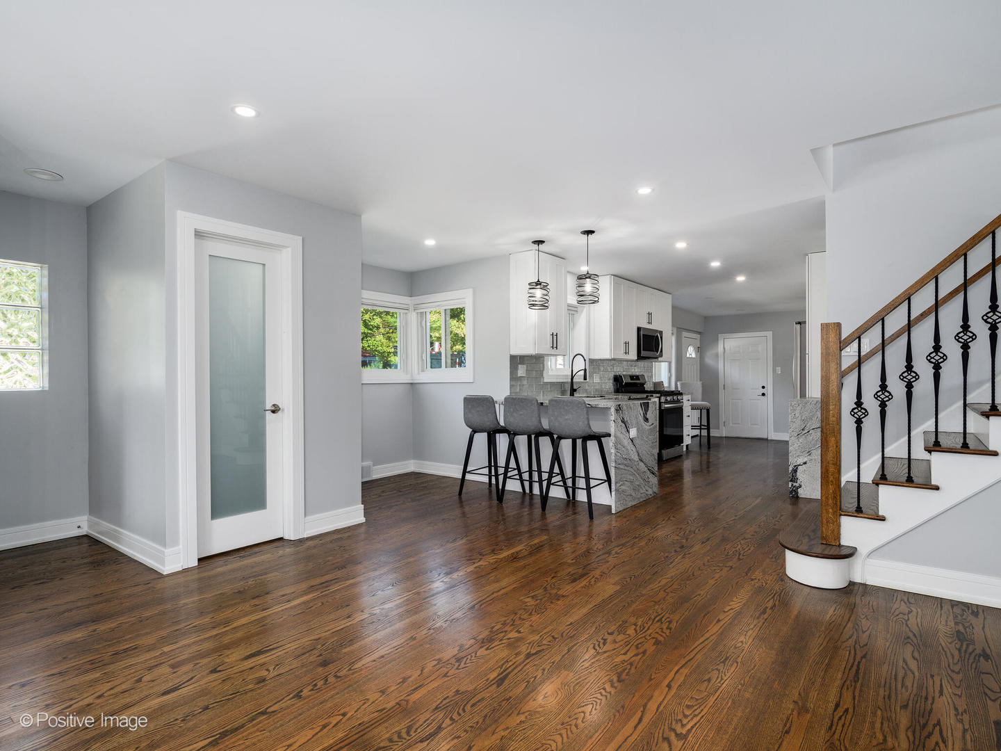 7225 East Prairie Road Lincolnwood, IL 60712 - Photo 17 of 27 a living room with furniture and a wooden floor
