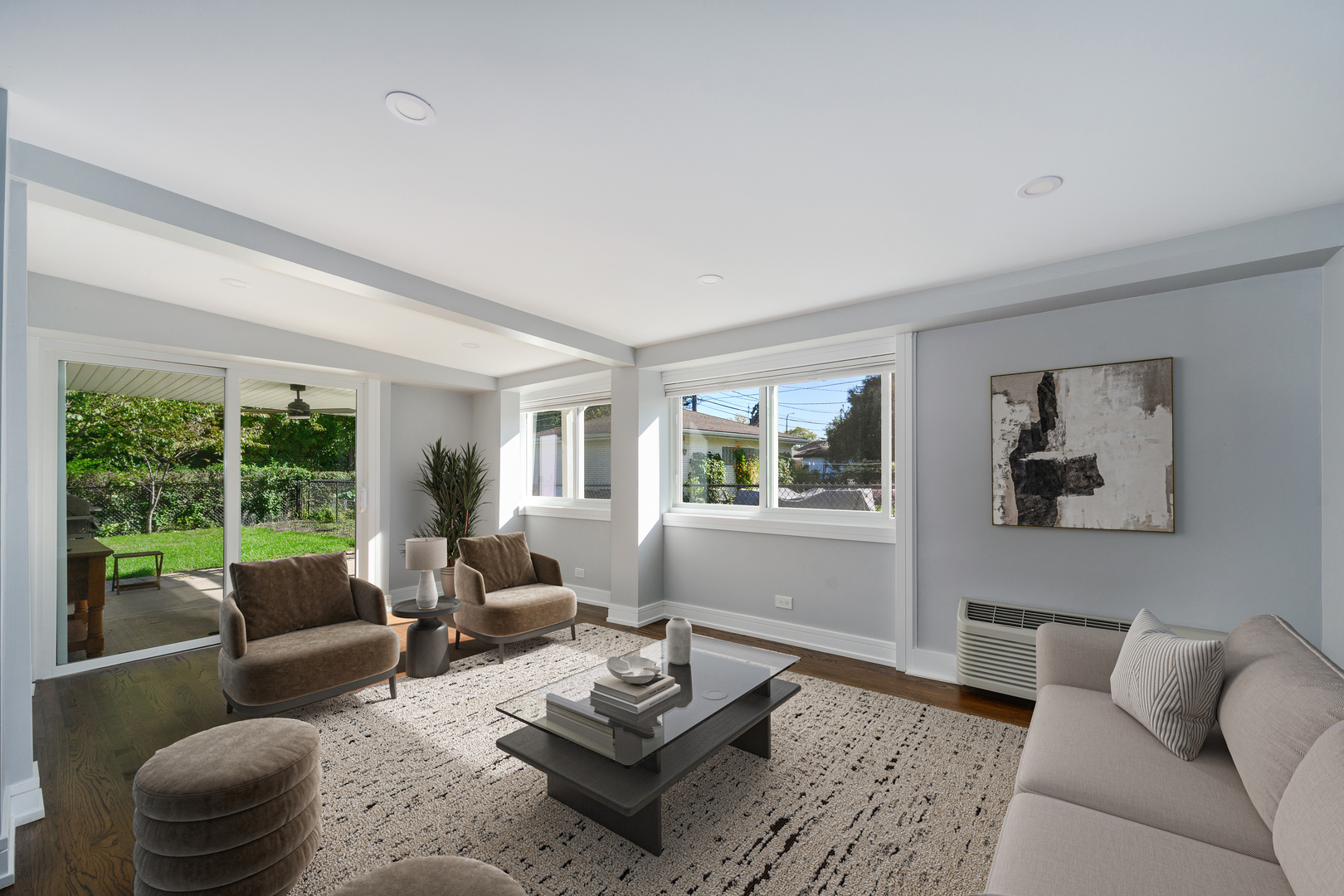 7225 East Prairie Road Lincolnwood, IL 60712 - Photo 5 of 27 a living room with furniture and a large window