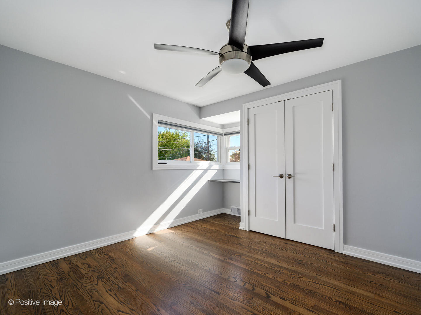 7225 East Prairie Road Lincolnwood, IL 60712 - Photo 6 of 27 a view of entryway and hall with wooden floor