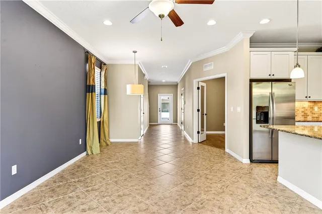 a view of a hallway with wooden floors