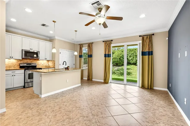 a large kitchen with cabinets