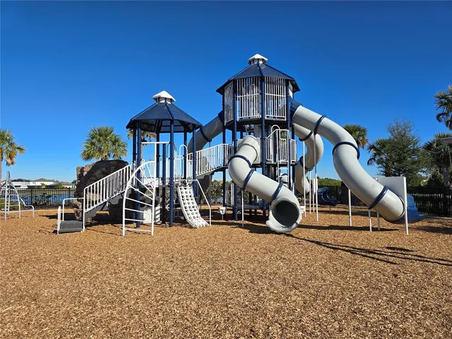 a view of a house with large space and sitting area