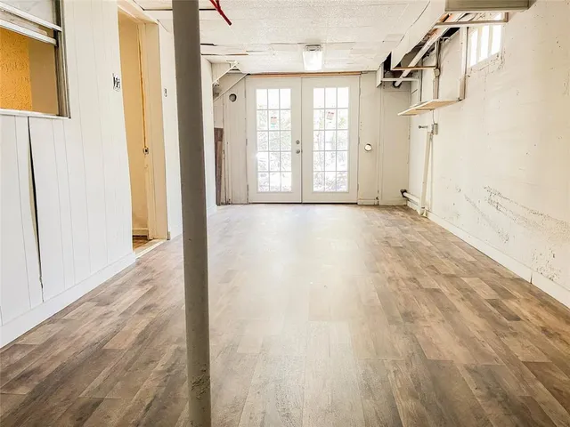 a view of a balcony with wooden floor