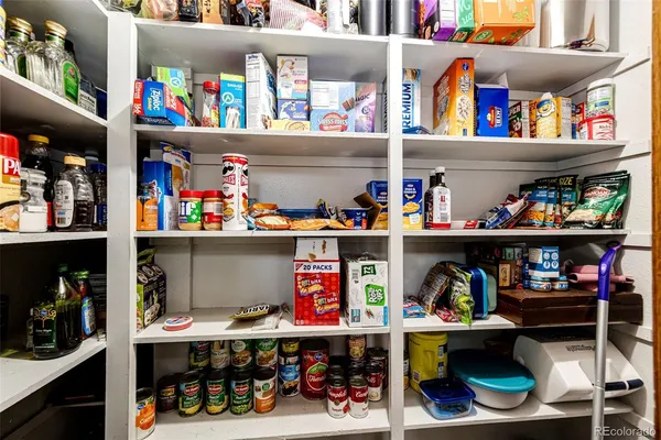 a room with chairs and table