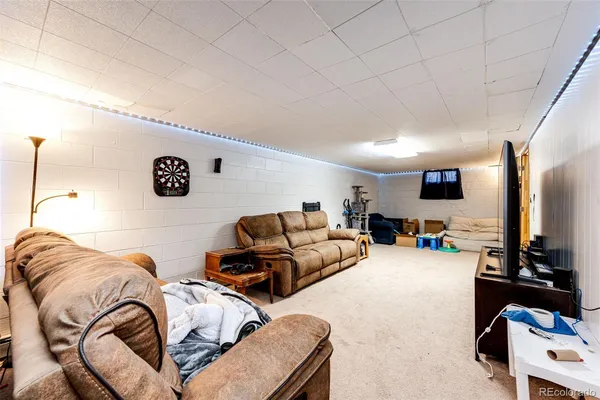 a bedroom with bed and window