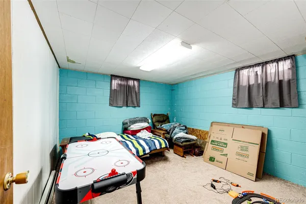 a room with furniture and a flat screen tv