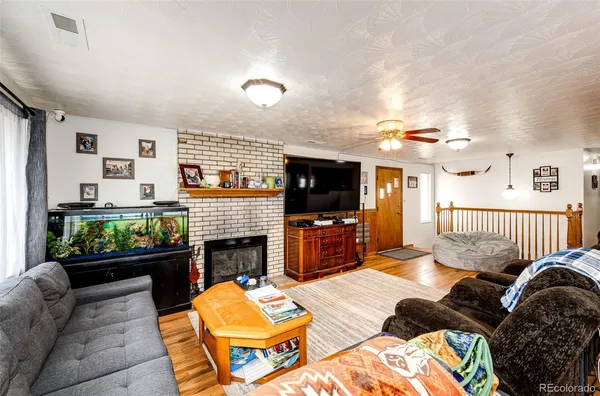 a bed room with a bed window and a flat screen tv