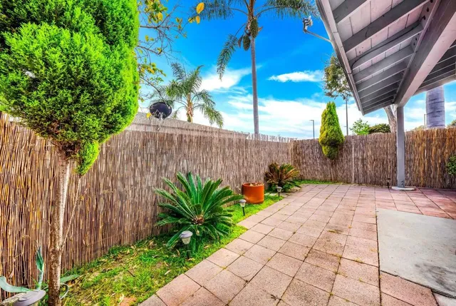 a garden view with a seating space