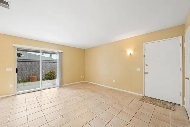 a view of an empty room with window