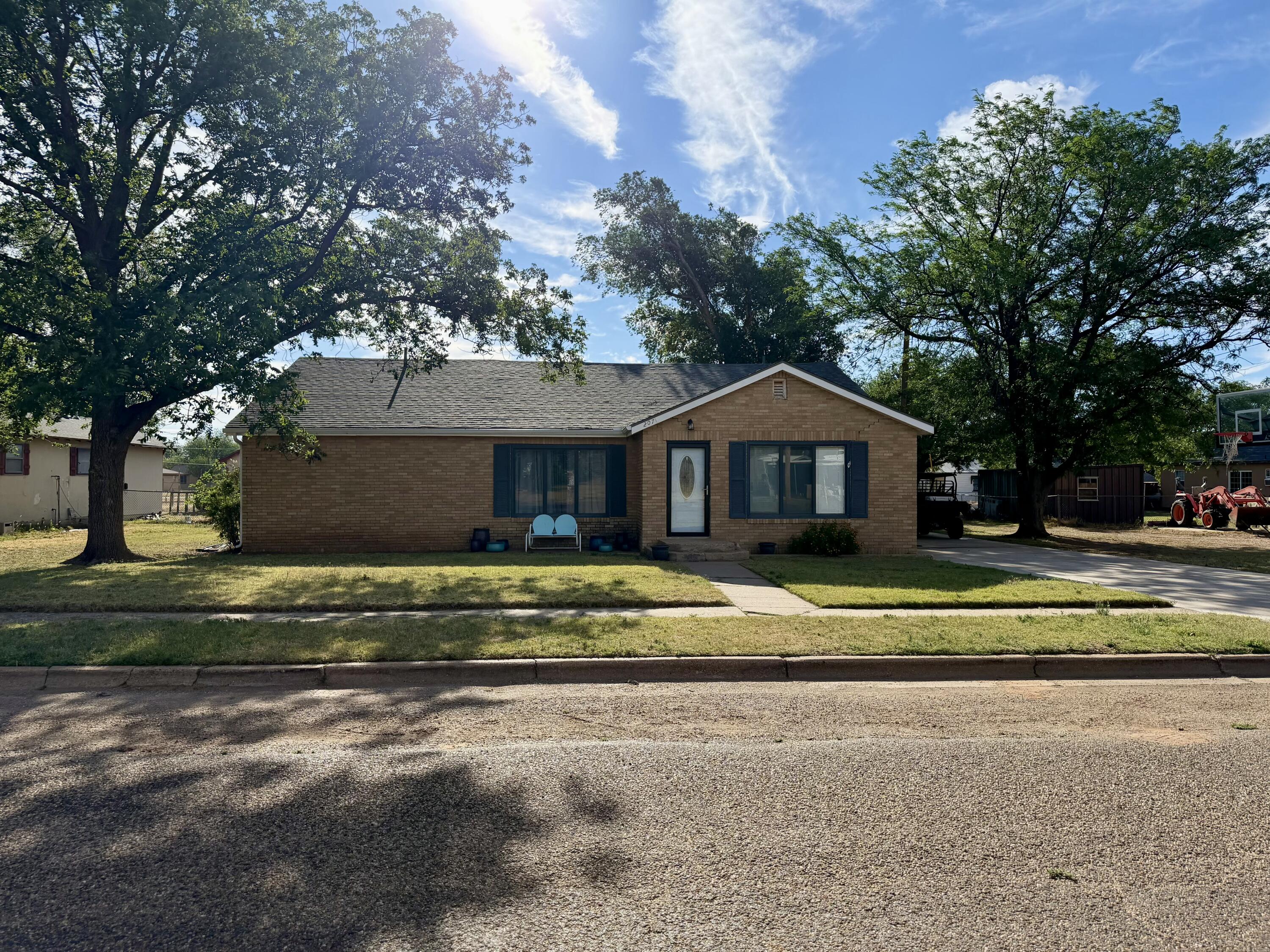 207 2nd Street Quitaque, TX 79255 - Photo 1 of 9 a front view of a house with a yard