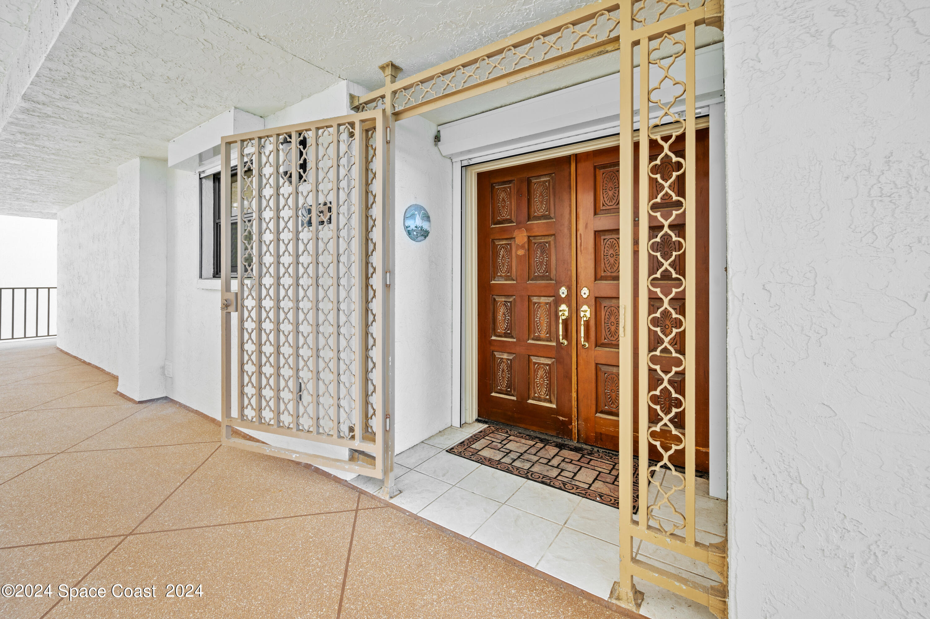 750 North Atlantic Avenue, Unit 608 Cocoa Beach, FL 32931 - Photo 1 of 39 a view of a door and a window