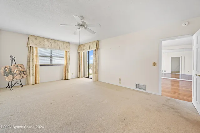 a hallway with cabinets