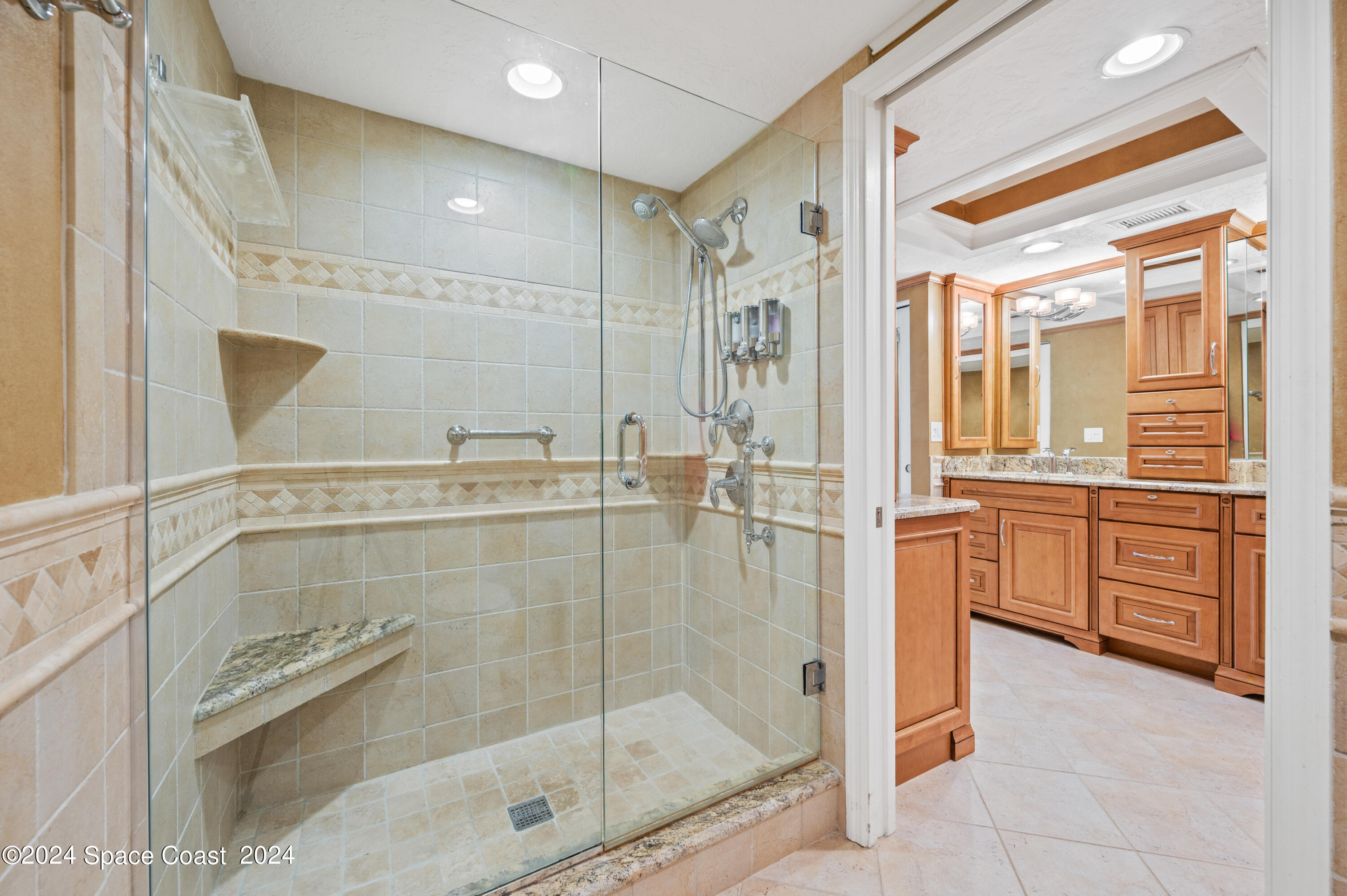 750 North Atlantic Avenue, Unit 608 Cocoa Beach, FL 32931 - Photo 19 of 39 a bathroom with a shower