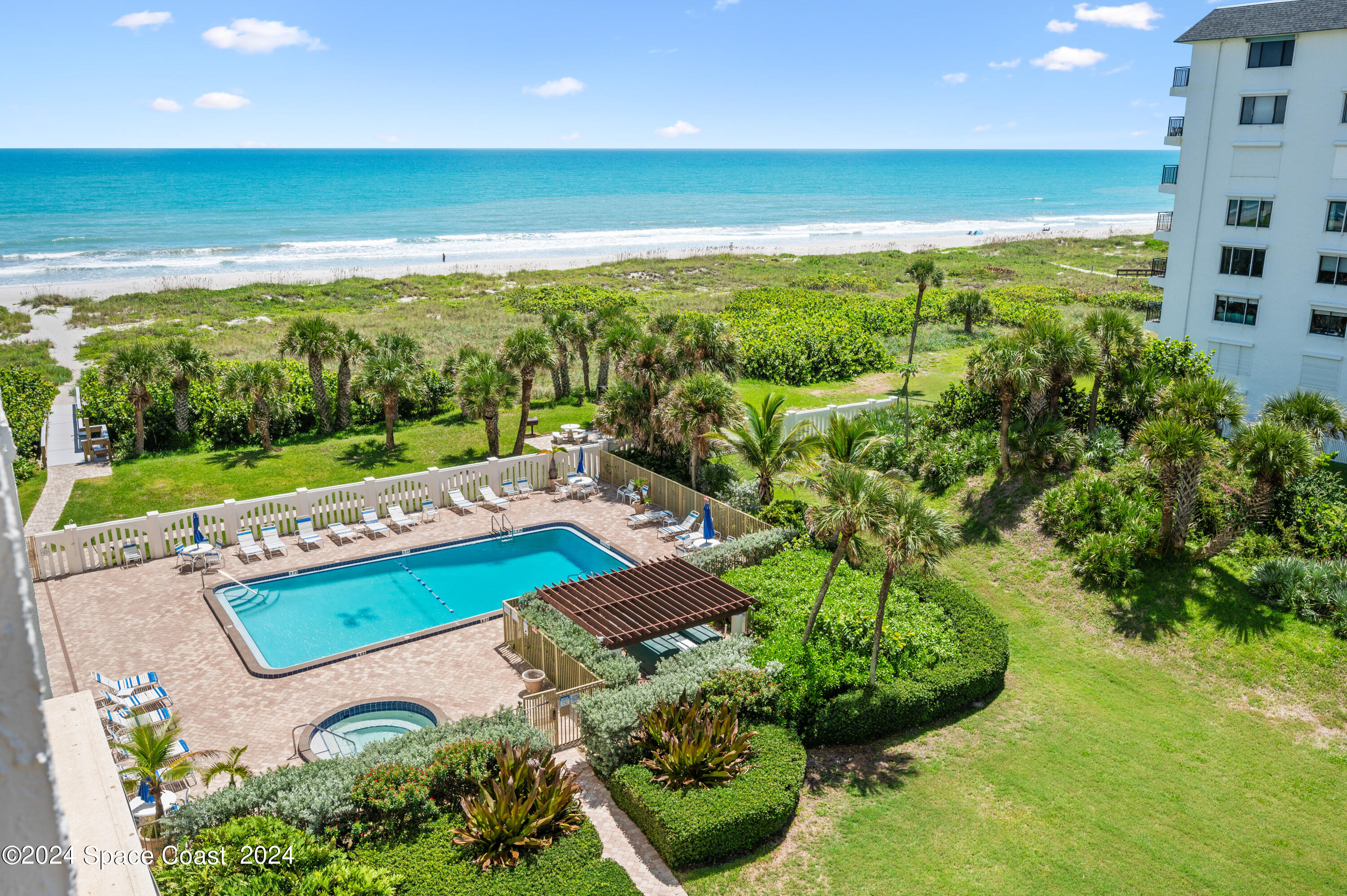 750 North Atlantic Avenue, Unit 608 Cocoa Beach, FL 32931 - Photo 3 of 39 a view of an outdoor space and a lake view