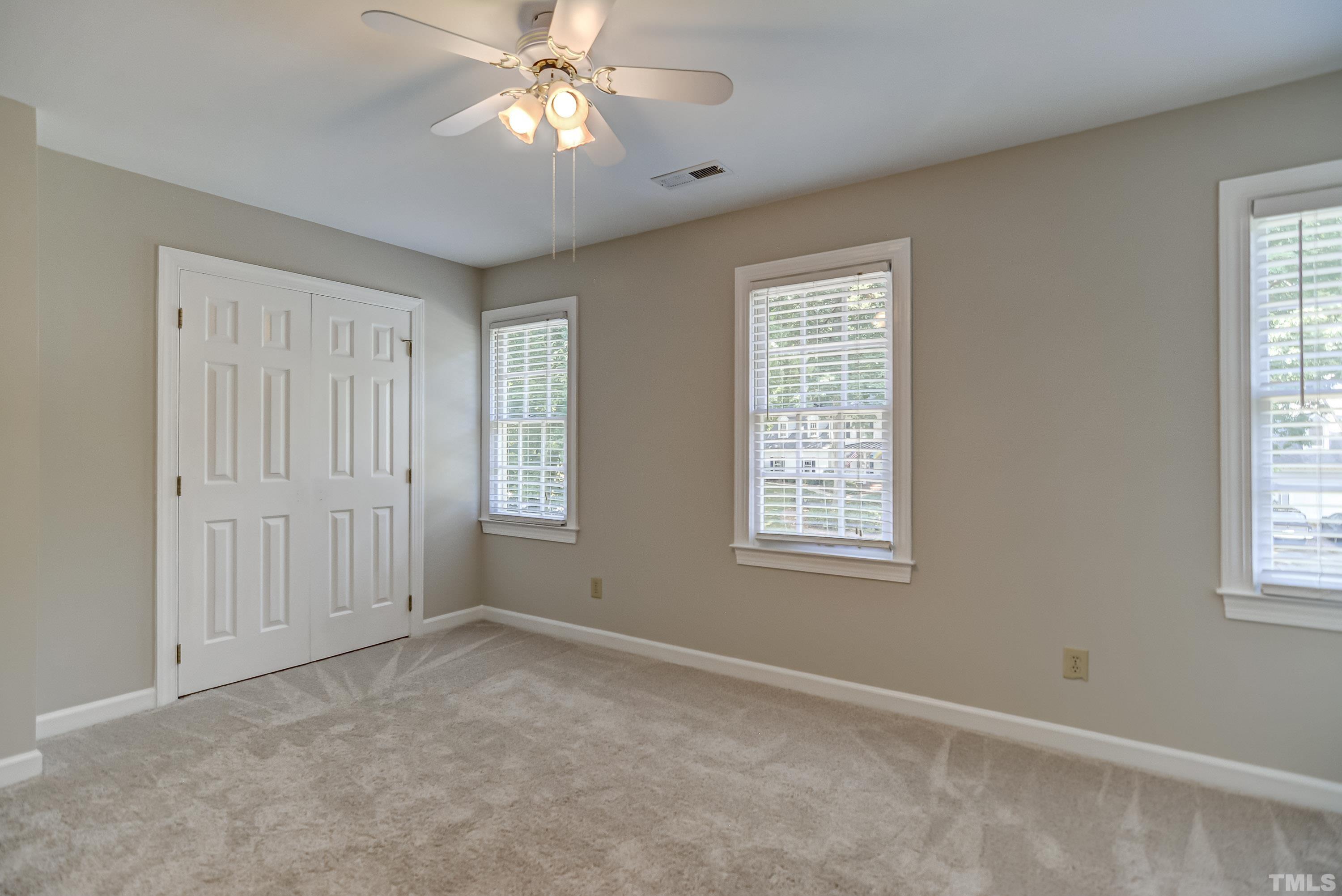 8313 Seagate Drive Raleigh, NC 27615 - Photo 15 of 24 a view of an empty room with a window