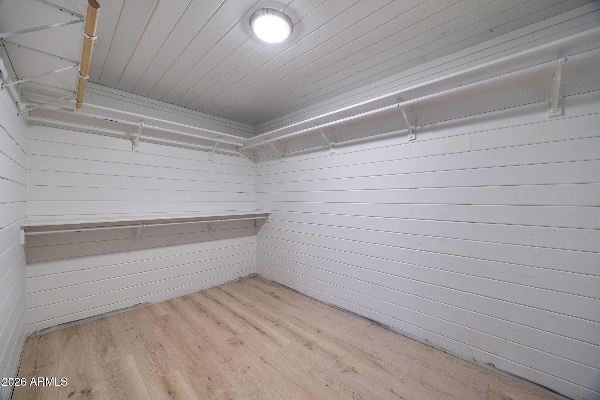 3310 Tonto Drive Overgaard, AZ 85933 - Photo 19 of 54 a view of an empty walk in closet