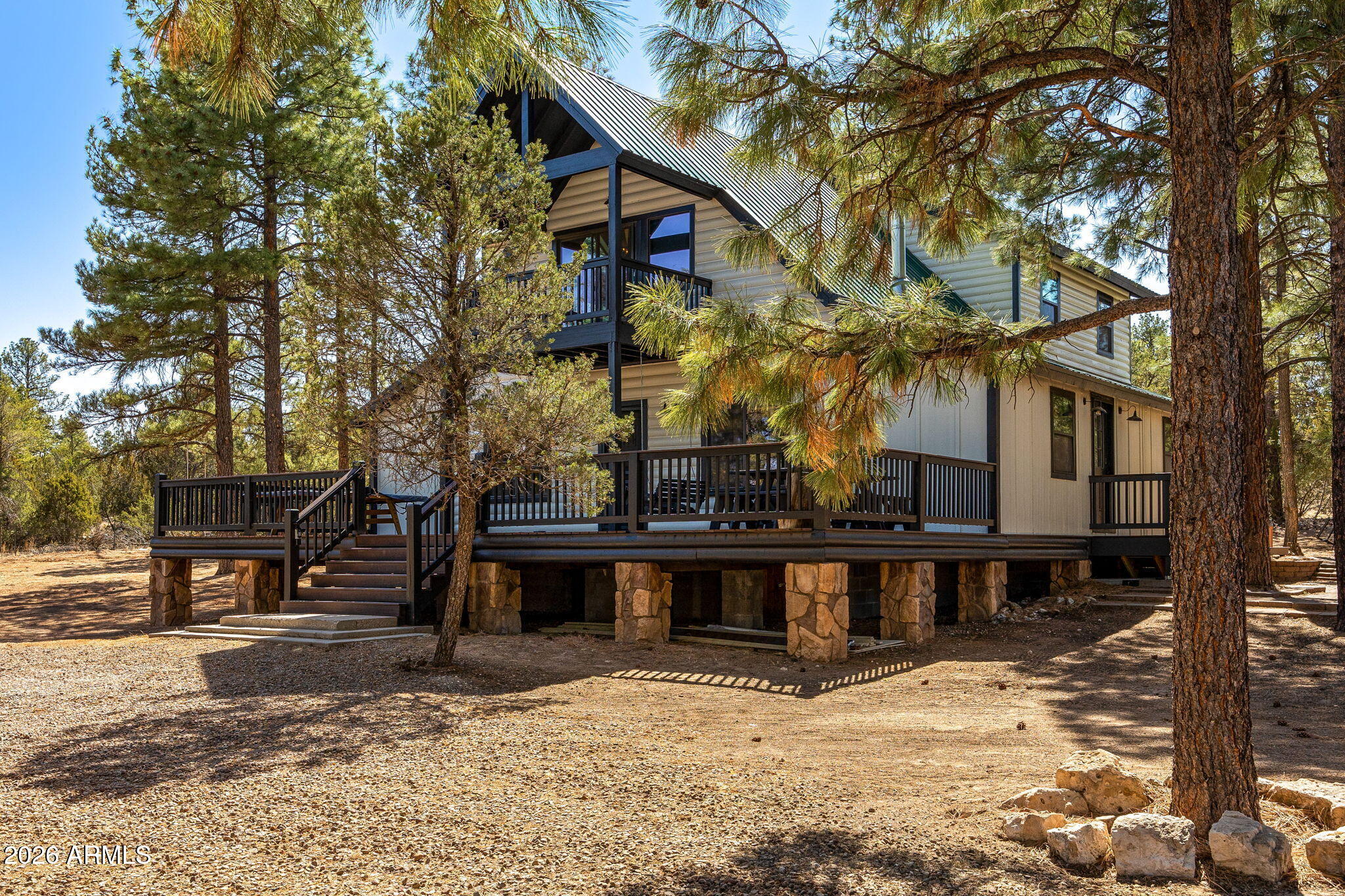 3310 Tonto Drive Overgaard, AZ 85933 - Photo 2 of 54 a view of a house with a yard