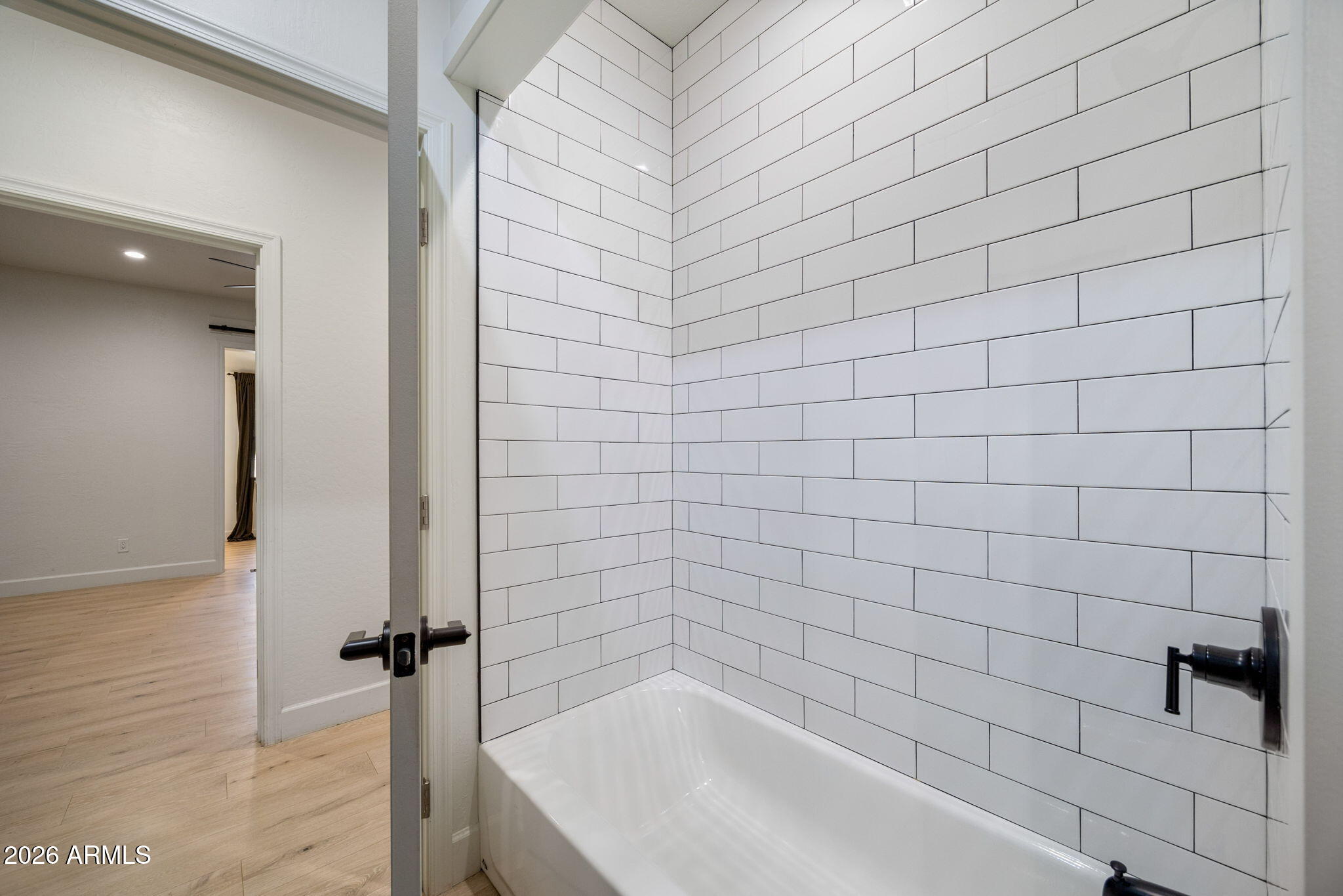 3310 Tonto Drive Overgaard, AZ 85933 - Photo 24 of 54 a bathroom with a bathtub