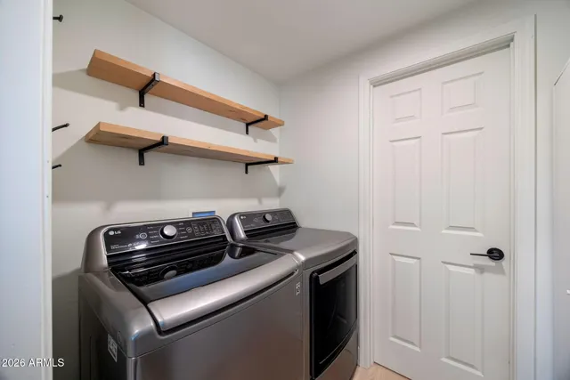 a view of a swimming pool with chairs