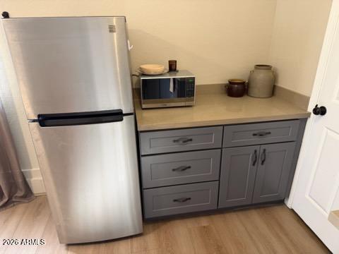 3310 Tonto Drive Overgaard, AZ 85933 - Photo 42 of 54 a kitchen with refrigerator and cabinets