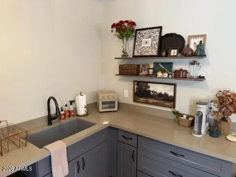 an aerial view of residential houses with city view