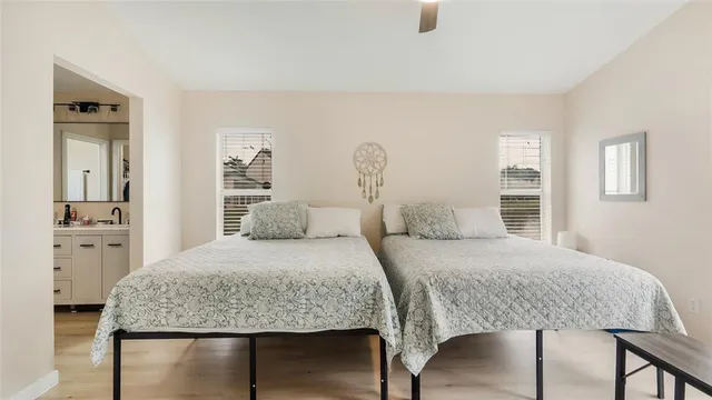a bedroom with a bed and a dresser
