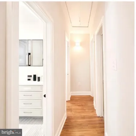 a view of a hallway with closet