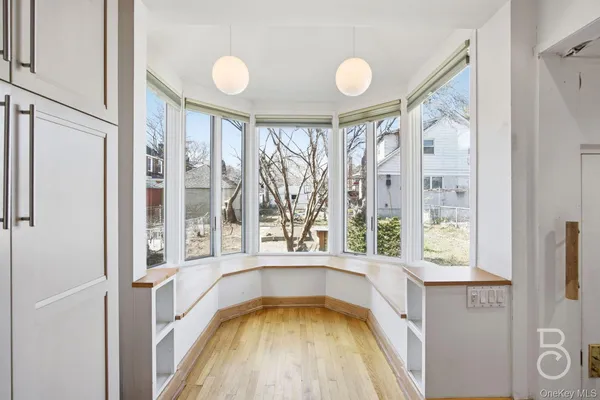 a view of a tub and window in a room