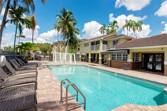 a view of deck with wooden floor and iron fence