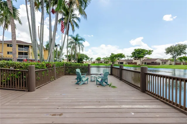a view of a park with palm trees
