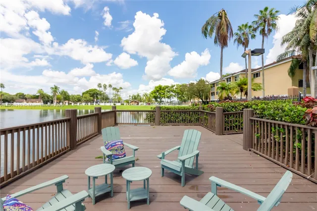a view of a park with palm trees