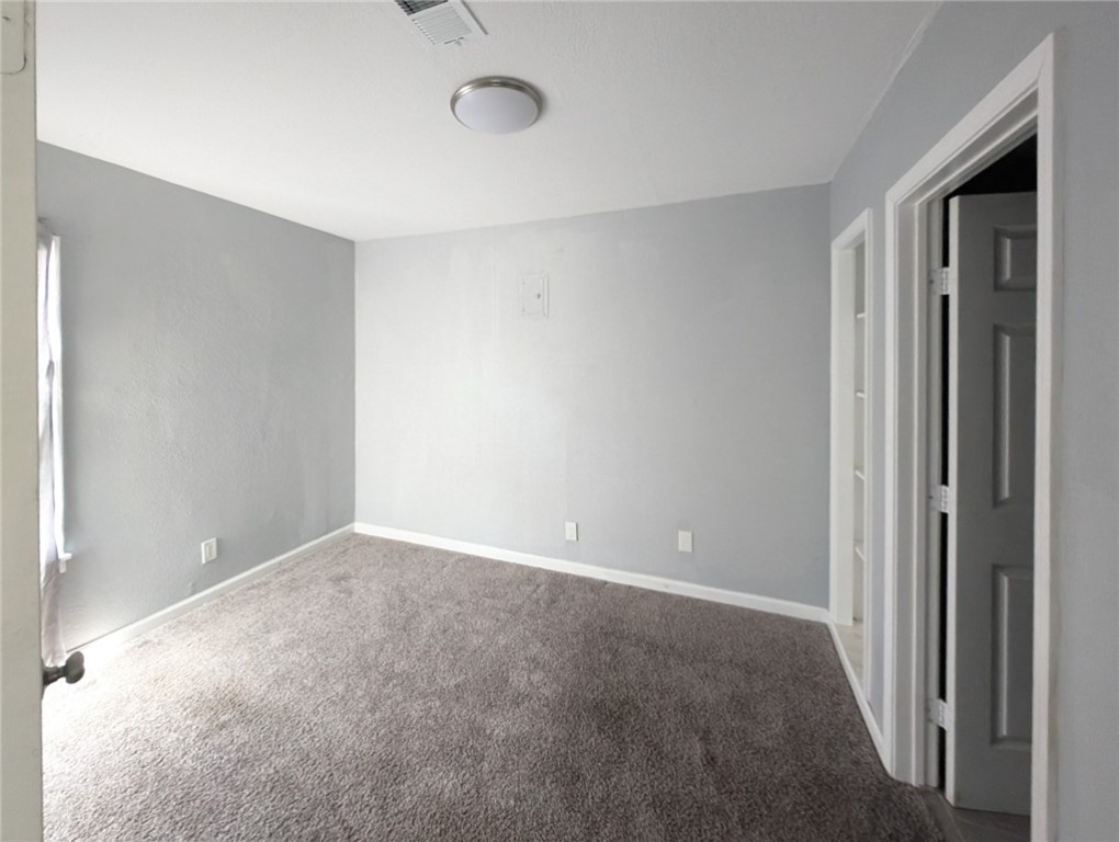 4709 Archer Drive Corpus Christi, TX 78415 - Photo 7 of 17 a view of an empty room with closet area