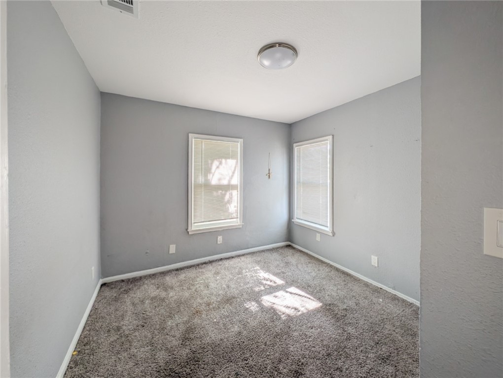 4709 Archer Drive Corpus Christi, TX 78415 - Photo 9 of 17 an empty room with windows