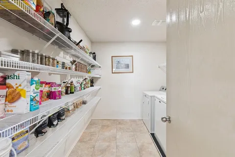 a view of an entryway with a lot of stuff