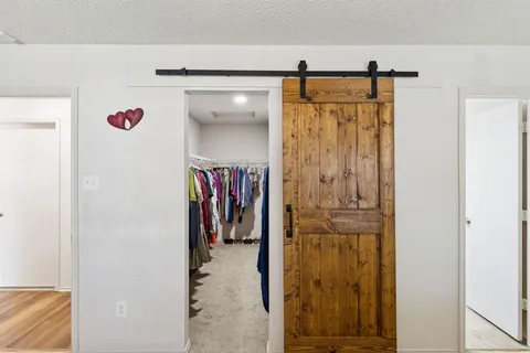 a bathroom with a sink a mirror and a shower