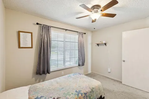 a house with trees in front of it