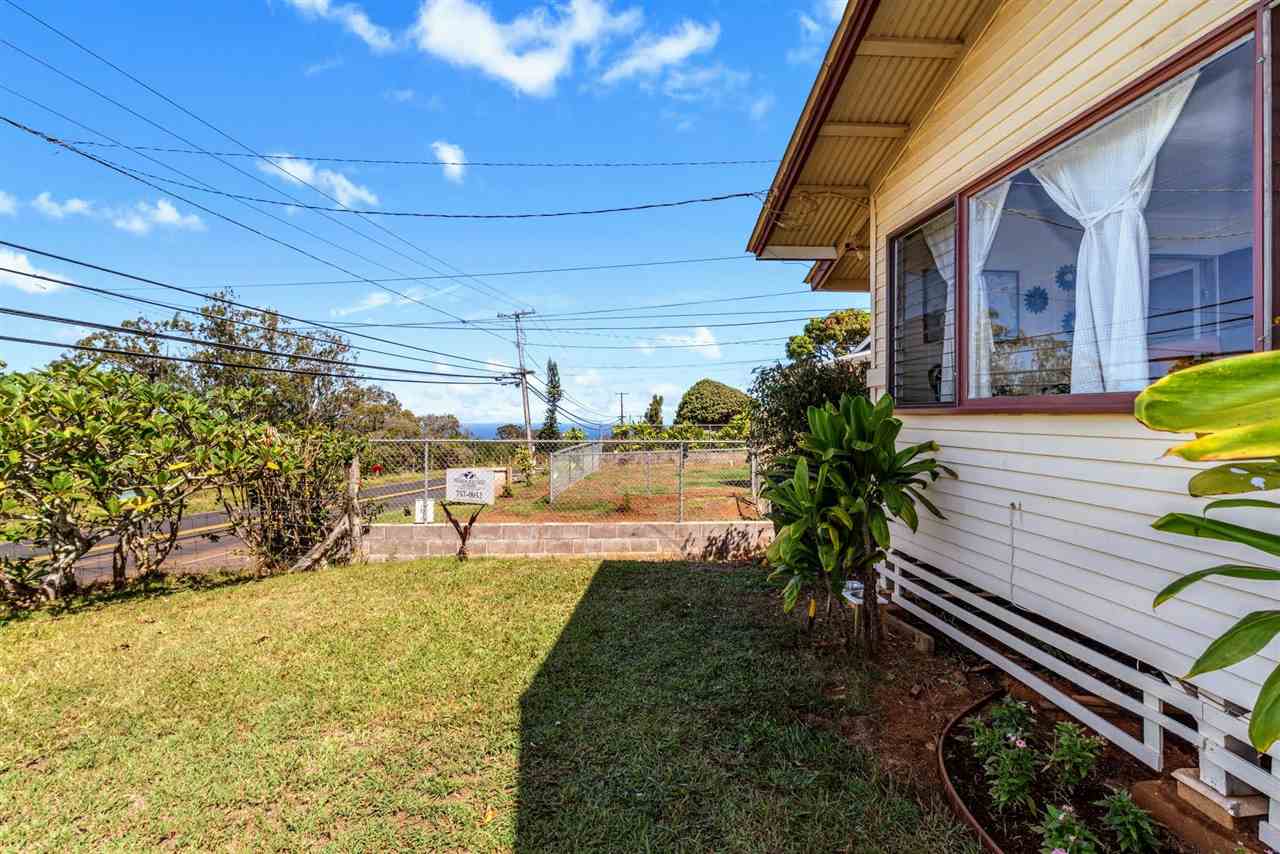 2229 Kaupakalua Road Haiku, HI 96708 - Photo 25 of 29 a view of a swimming pool with a patio
