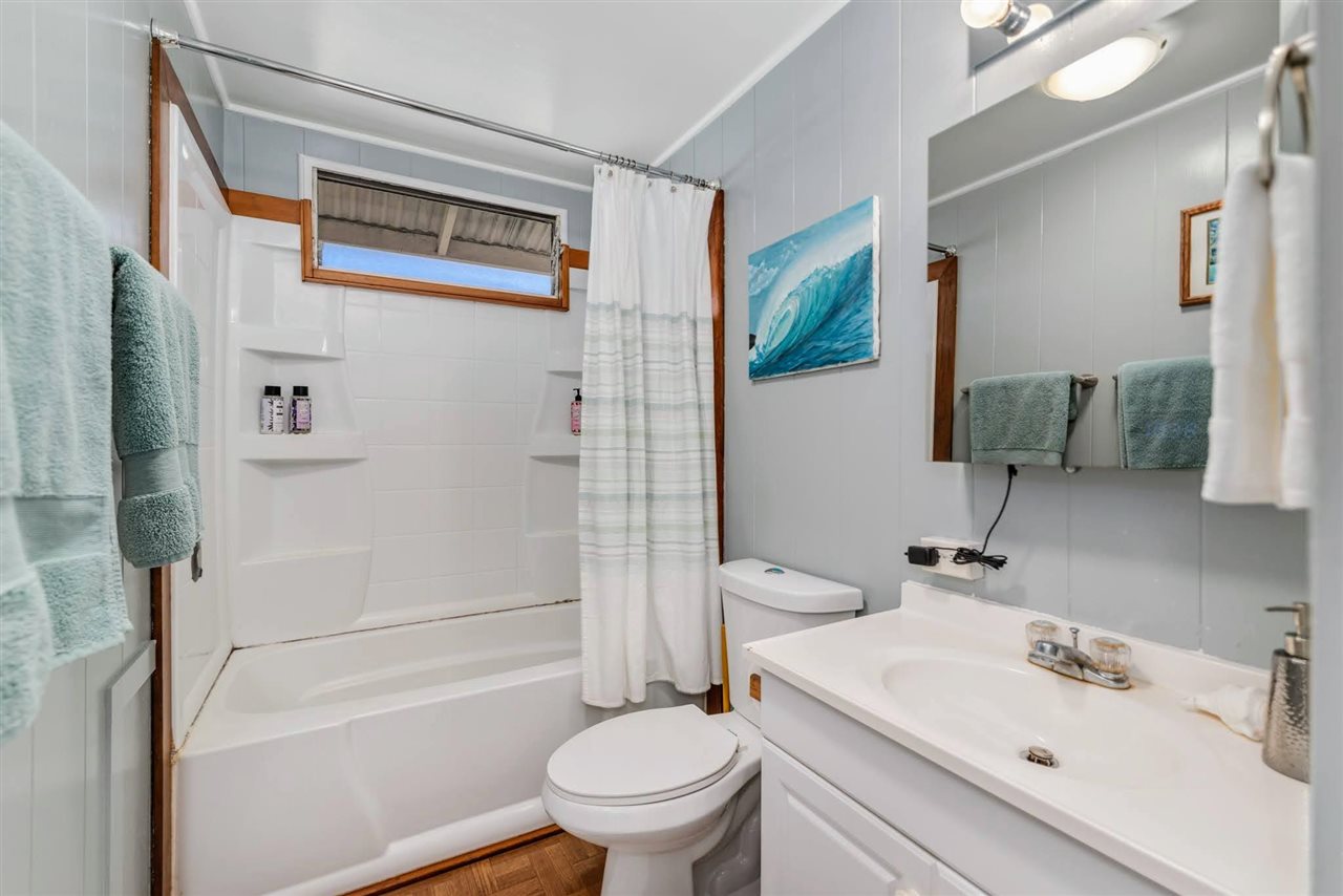 2229 Kaupakalua Road Haiku, HI 96708 - Photo 10 of 29 a bathroom with a sink toilet and shower