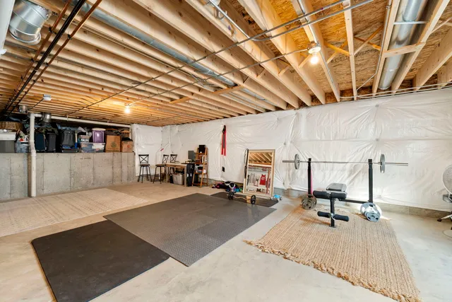 a view of a hall with wooden floor