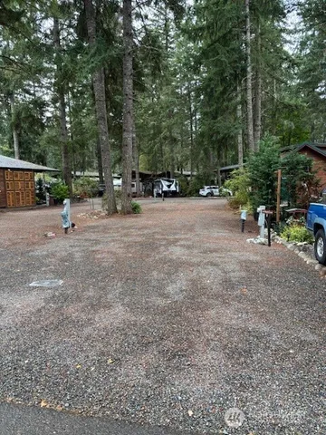 a view of a park with of trees